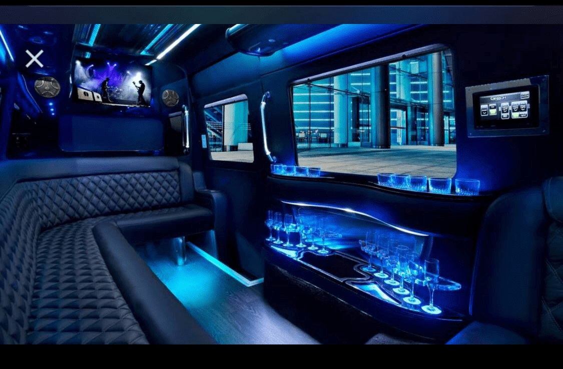 The interior of a limo with blue lighting